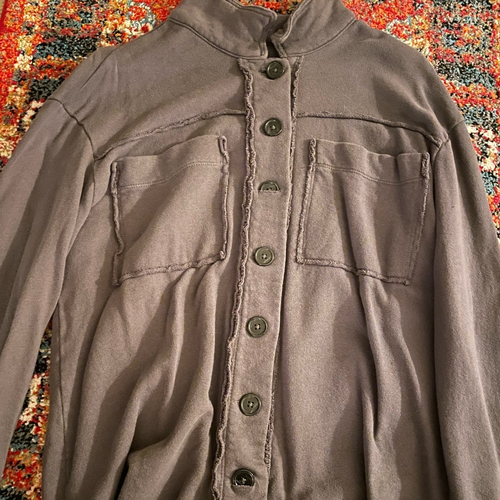 Womens shacket with two front pockets and buttons. Size M.